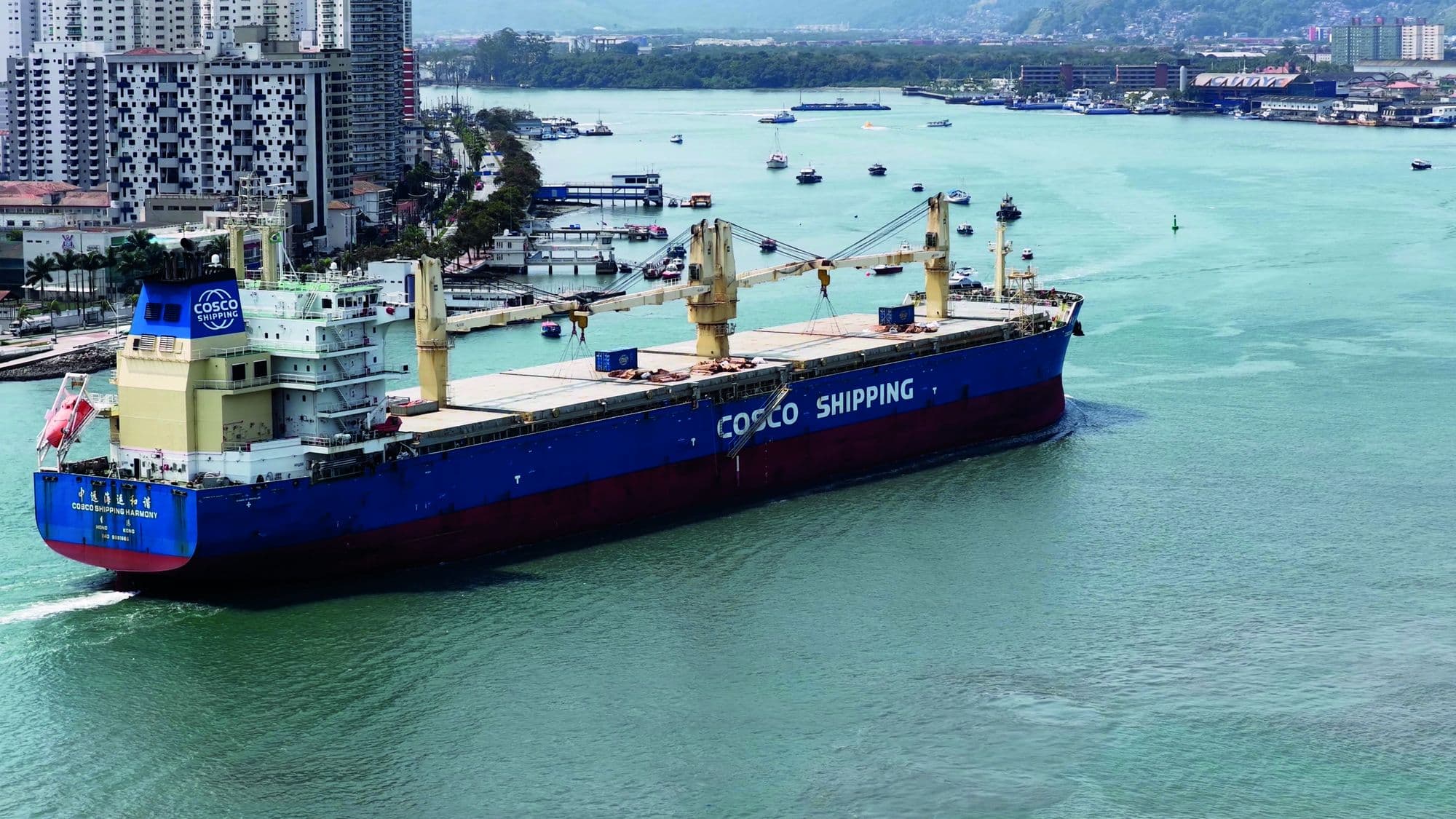 A bulk carrier under way in a busy shipping channel